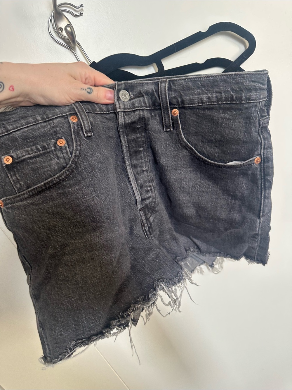 Women's Levi 501 Distressed Black Denim Shorts - size 28